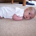 August 2007 - Kylee rolling over - 2 month (3)
