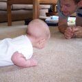 August 2007 - Kylee rolling over - 2 month (4)