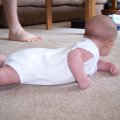 August 2007 - Kylee rolling over - 2 month (5)