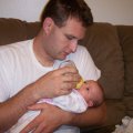Daddy feeding kylee
